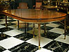 A Louis XVI mahogany dining table